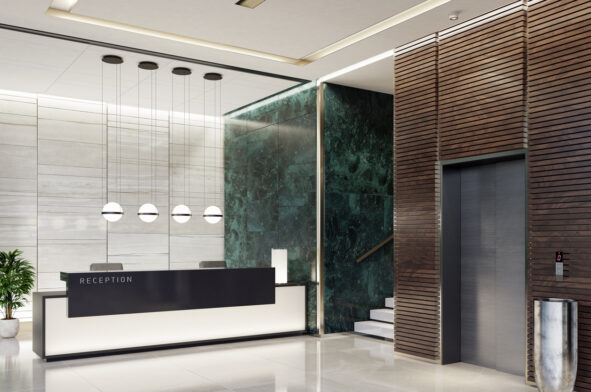 A modern office featuring a reception desk and a glass wall, highlighting the Registered Office Address prominently.