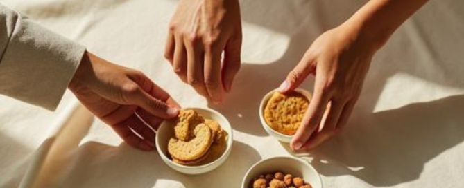 3 hands placing down pantry staples