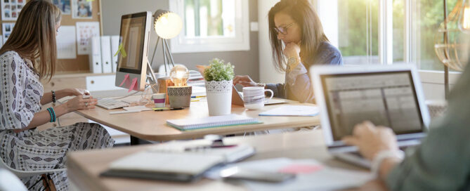Businesswomen working in co-working space